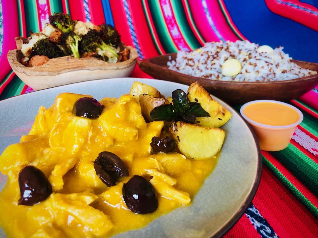 Aji de Gallina:  Creamy Yellow Chicken · Chicken, creamy aji Amarillo sauce, aged Parmesan, Kalamata olives, potatoes. It comes with Andean rice (rice with quinoa and heirloom Andean corn) and herb-roasted veggies. Gluten-free, nut-free, shellfish-free, egg-free and soy-free.