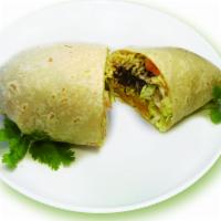 B5. Steak Burrito · A large flour tortilla filled with mexican rice, black or pinto beans, lettuce, tomatoes, ch...