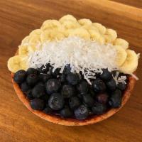 Blue Açaí · Strawberries & Spirulina, topped with Blueberries, Banana & Coconut Flakes.