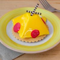 Passion Mousse · Fresh passion fruit juice mix cheese cream and chantilly with vanilla biscuit base.