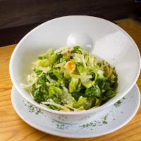 Caesar Salad · Romaine, arugula, shaved parmesan, bacon, croutons and caesar dressing.