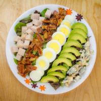 Cobb Salad · Mixed lettuce, blue cheese, bacon, grilled chicken, tomatoes, boiled eggs and avocado.