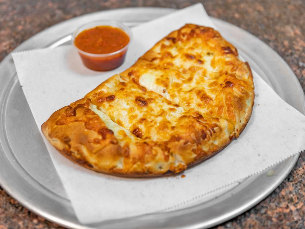 Chicken Ranchero Calzone · Grilled chicken, bacon, tomatoes, and ranch dressing.
