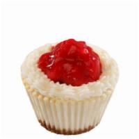 Cherry Cheesecake  · Our version of the traditional cheesecake with just the right amount of cherry topping, rimm...