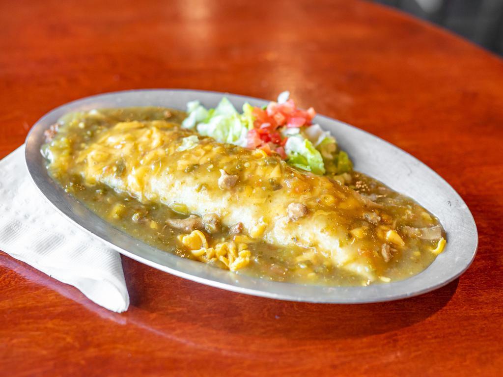 Breakfast Burrito Smothered · 2 eggs, potatoes, and cheese. Smothered in chili.