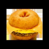 Slumber Lumber · Signature Donut, Savory Sausage, Scrambled Egg & Cheese.