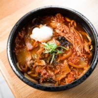 Pork Kimchi Udon · Thin slices of pork belly, kimchi (spicy pickled cabbage), enoki mushroom, poached egg.