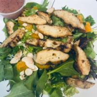 Asian Chicken Salad · Spinach, spring mix, grilled chicken, mandarin oranges, and toasted almonds served with our ...