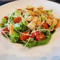 Caesar Salad · Romaine, shaved parmesan, croutons, grape tomatoes, and Caesar dressing. Served with grilled...