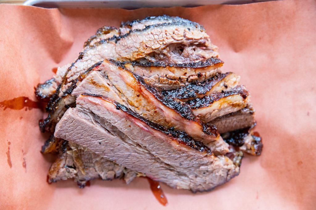 Brisket Moist · Traditionally smoked over Texas Post Oak and cut from the marbleized deckle or point of the brisket.