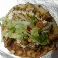 Spicy Chicken Gyro Sandwich · Same as our original chicken gyro, but with some fire. The chicken is mixed with a homemade ...