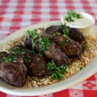 Kafta Kabob · Ground beef seasoned with onions, fresh parsley and a special blend of Mediterranean spices,...