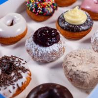 Classic Half Dozen Assortment · Indulge in an assortment of our classic doughnuts, selected just for you.