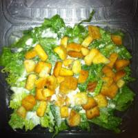 Caesar Salad · Served with garlic bread.