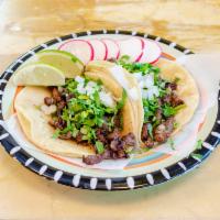 Estillo DF Taco · Choice of meat, cilantro, and onion.