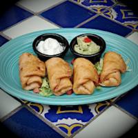 Chicken Baby Chimis · Shredded chicken and cheese wrapped in a mini flour tortilla and lightly fried. Served with ...