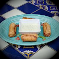 Jalapeno Baby Chimis · Jalapeno and cream cheese filled mini chimichangas. Served with cucumber ranch dressing. Veg...
