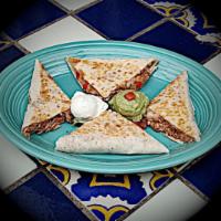 Hectors Quesadilla · Melted cheese with mild red and green chilies. Served with salsa fresca, guacamole, and sour...