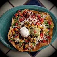 Taco Salad · Crisp tortilla bowl filled with shredded lettuce, cheese, corn salsa, salsa fresca, enchilad...