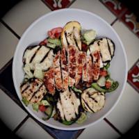 Sunburst Salad · Marinated grilled chicken, grilled vegetables, roasted mushrooms, cucumbers, avocado, salsa ...