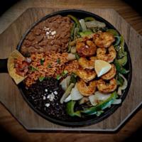 Baja Shrimp · You'll hear it coming. Served on a sizzling platter, accompanied with our specially spiced, ...