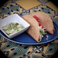 Kids Taco · Chicken or ground beef, lettuce, cheese, and tomato.