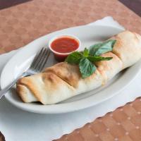 Chicken Roll · Made with pizza dough rolled with tender pieces of chicken cutlets, tomato sauce, and mozzar...