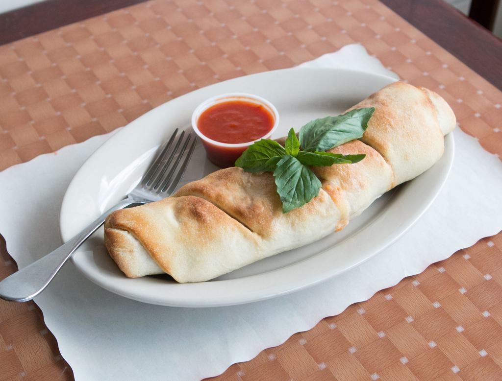 Chicken Roll · Made with pizza dough rolled with tender pieces of chicken cutlets, tomato sauce, and mozzarella cheese. 