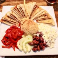 Hummus and Pita Platter · Mediterranean classic with feta cheese, cucumbers, roasted red peppers and pita slices.