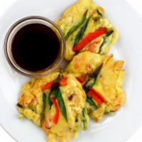 Hae-Mul-Pa-Jon · Korean seafood pancake. A harmony of squid, shrimp, green onions, bell peppers, and onions i...