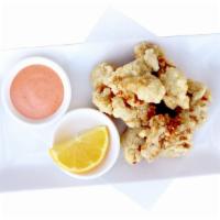 Chicken Karaage · Lightly seasoned and battered chicken bites served with a spicy mayo.