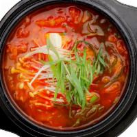 Kimchi Jjigae · Kimchi stew. A spicy, hearty kimchi stew with pork, tofu, enoki-mushrooms and scallions. Ser...