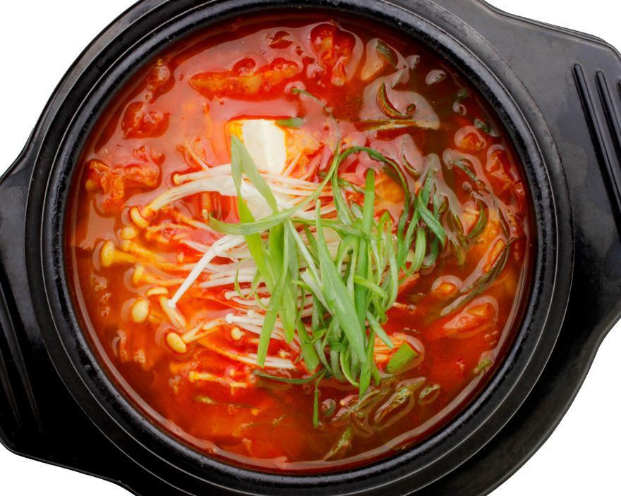 Kimchi Jjigae · Kimchi stew. A spicy, hearty kimchi stew with pork, tofu, enoki-mushrooms and scallions. Served with side dishes.