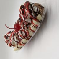 Banana Split  · your choice of 3 scoops of ice cream with a sliced banana, whipped cream, strawberry sauce, ...