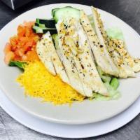 Grilled Chicken Salad · Grilled chicken breast on lettuce, with tomatoes, cheese, and choice of dressing.