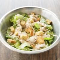 Classic Chicken Caesar · Romaine, pulled chicken breast, parmesan, croutons and Caesar dressing.