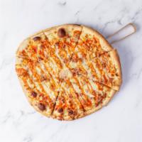 Spicy CBR Pizza · Hot sauce, chicken, bacon, mozzarella cheese and topped with ranch dressing.
