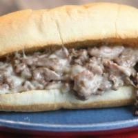 Philly Steak Sandwich · Beef. Served with choice of chips or fries.