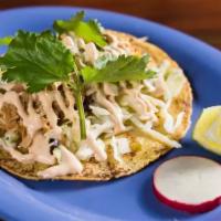 Bohemian Taco · Lime braised chicken, Cali coleslaw, salsa verde, diced onion and chipotle crema. Served wit...