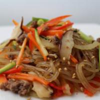 Japchae · Glass noodles, carrot, spinach, mushrooms and thinly sliced marinated beef flavored with soy...