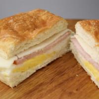 Canadian Bacon, Egg & Provolone Cheese on a Croissant · Farm-fresh egg, Hormel Canadian bacon and Tillamook provolone cheese on a fresh buttery croi...