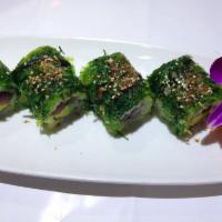R106. Hawa Roll · Tuna, avocado and jalapeno topped with seaweed salad.