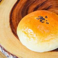 Redbean Bread · Sweet bun with red bean filling. Contains: wheat, egg, milk, and soy.