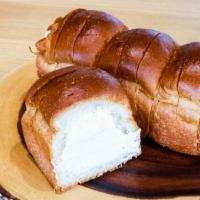 Butter Cream Bread · Family size loaf of sweet bread with buttercream in every other layer. Contains: wheat, milk...
