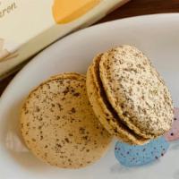 Vanilla Macaron · Vanilla flavored macaron. Contains egg, milk, soy, peanut and tree nut.