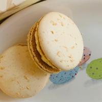 Coconut Macaron · Coconut flavored macaron. Contains egg, milk, soy, peanut and tree nut.