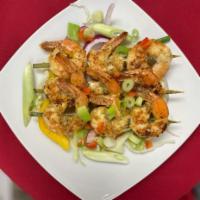 Cajun Spiced Grilled Shrimp Satay (9 Pieces) · 9 PC's of shrimp seasoned with cajun spices and grilled to perfection and served.