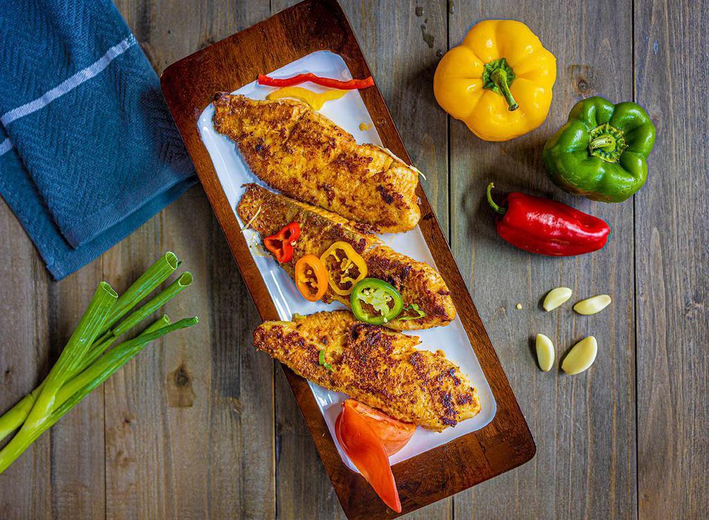 Grilled Cajun Spiced Tilapia (3 Pieces) · Tilapia Fillet marinated with cajun spices and Grilled