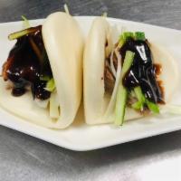 Peking Duck Buns - 2 pcs · Sliced duck with cucumber and scallion in Hoisin sauce.