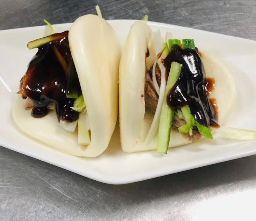 Peking Duck Buns - 2 pcs · Sliced duck with cucumber and scallion in Hoisin sauce.